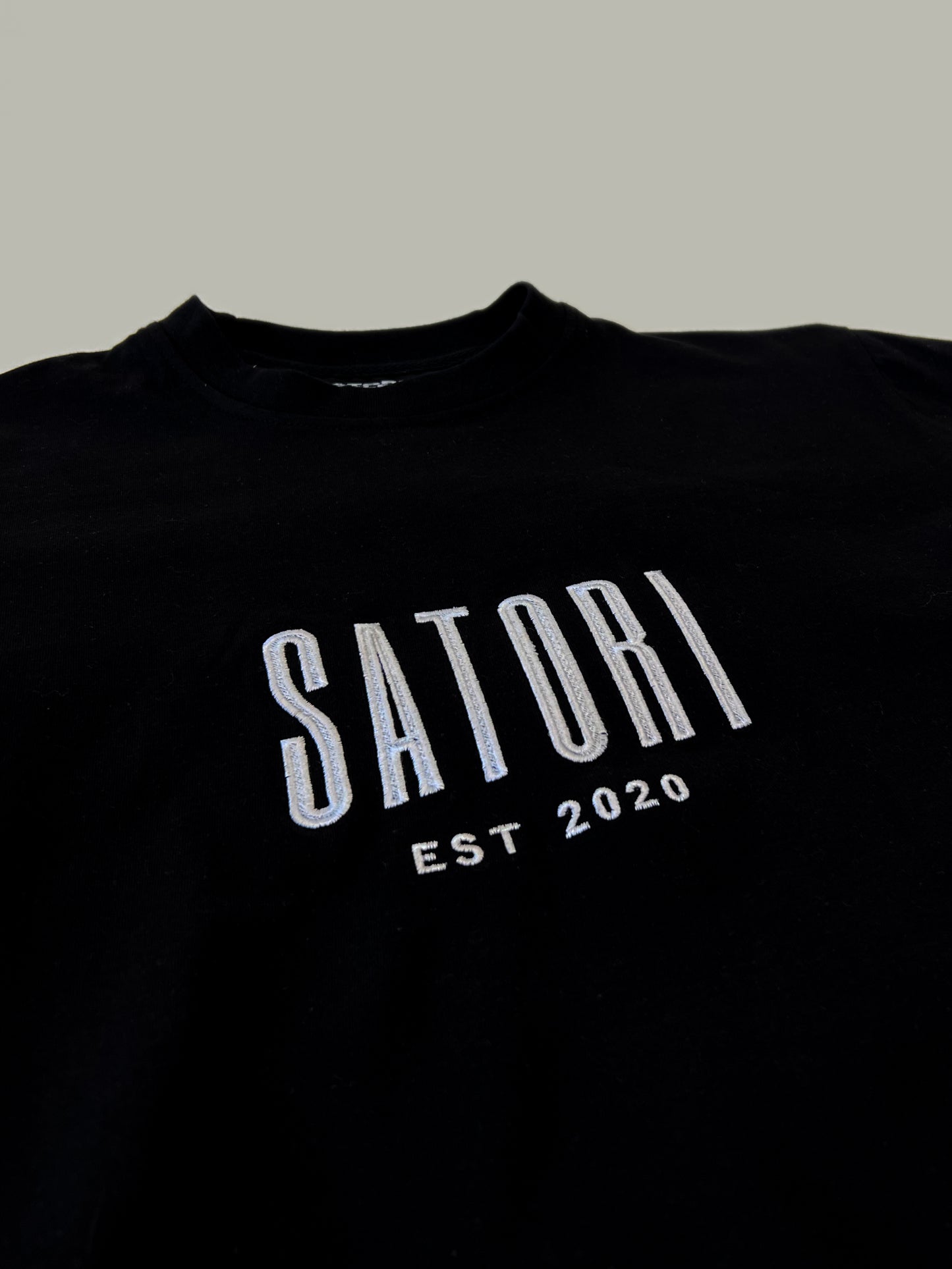 
                  
                    BLACK SATORI TEE
                  
                